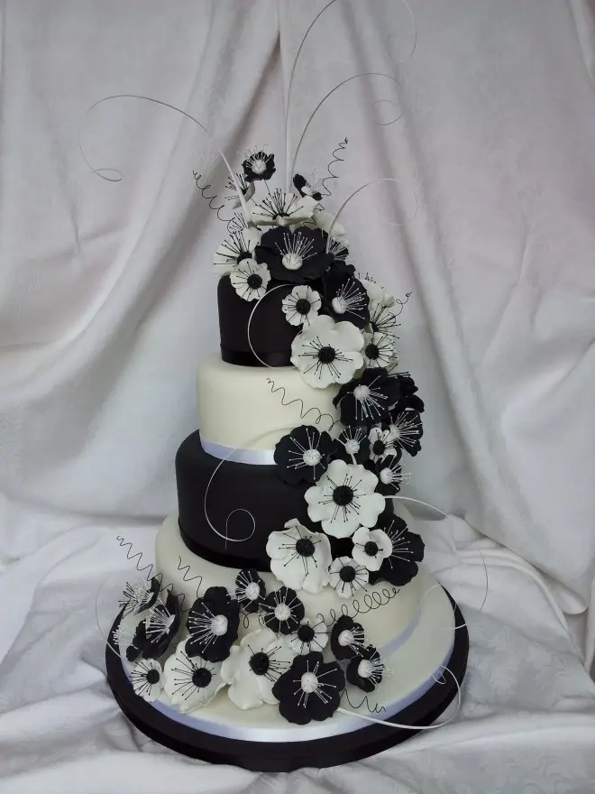 White and Black with Trailing Flowers 4 Tier Wedding Cake